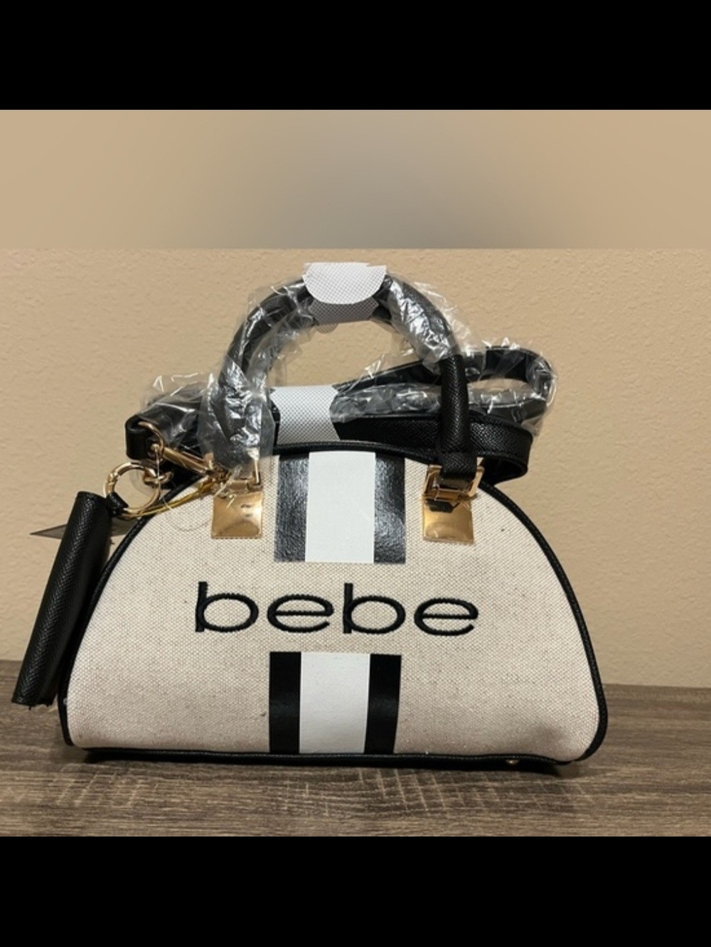 bebe Cream and Black Striped Dome Satchel